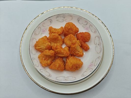 Salyangoz şeklindeki şişmiş atıştırmalıklar